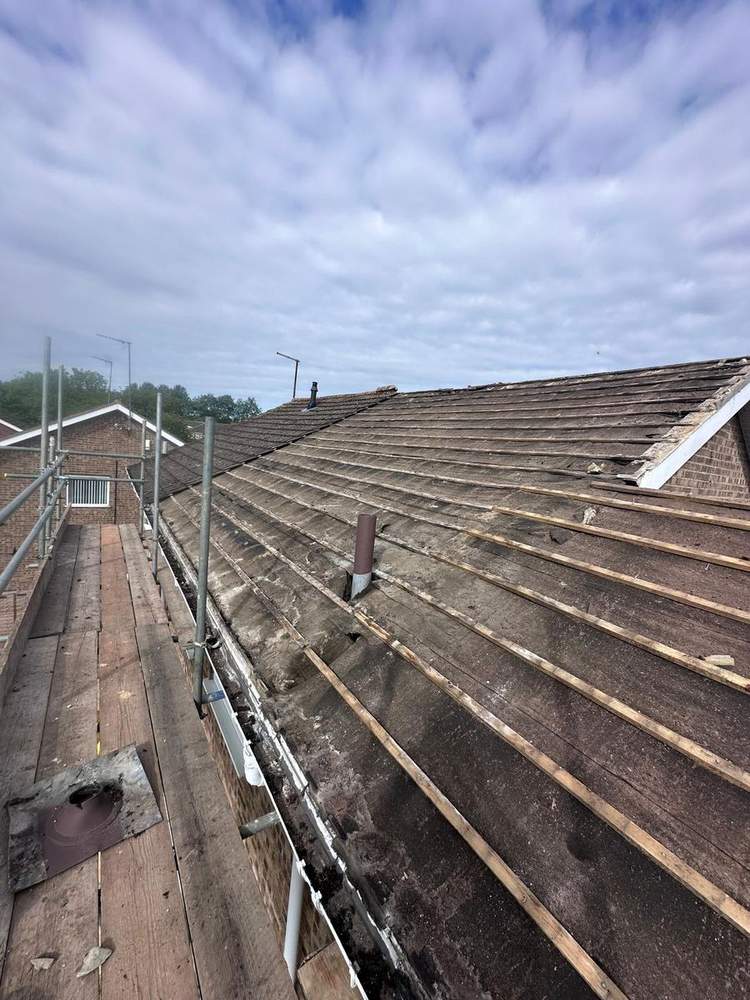 Damaged roof before repair in Slough